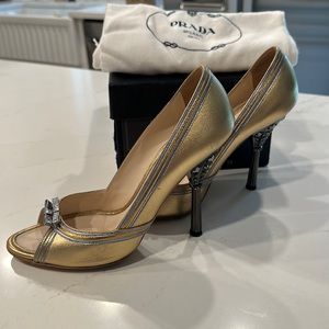 Gold Prada Pumps